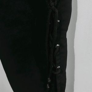 Flared Black Jeans With Cut Design