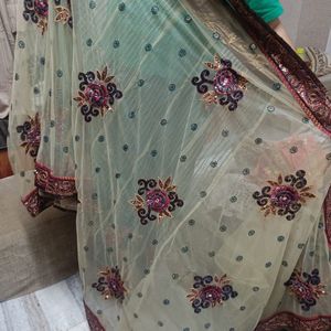 Multicoloured Net saree With maroon Blouse