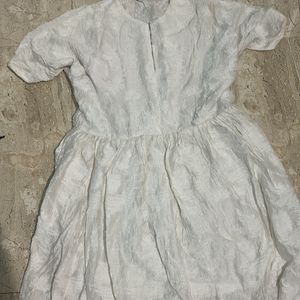 Vintage White Dress with Textured Fabric.