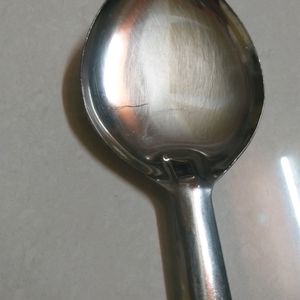 big kitchen spoon for serving food