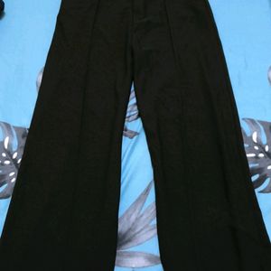 A Dark Olive Colored Flared Trouser