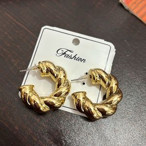 Curly Twisted Gold Statement Earrings