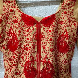 Golden Kurti With Red Embroidery