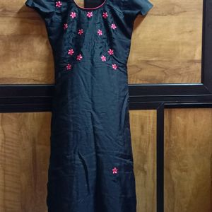 It's Black Kurti With Red Thread Worked Flowers 🌺