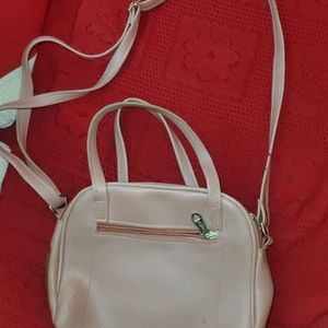 Peach Colour Hand Bag And Sling Also