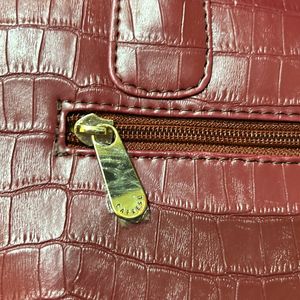 Caprese Maroon Handbag