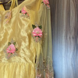 Yellow Colour Net Gown Full Slvees