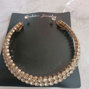 White Golden Neckpiece n studs(negotiable)