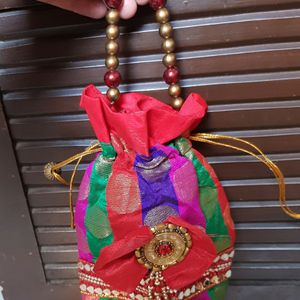 Small Bag To Carry With Saree.