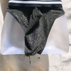 I. GLITTERY BLACK BRIEF