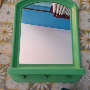 Mirror With Comb Stand