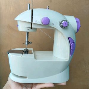 MINI SEWING MACHINE