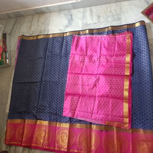 A Pattu Navy Blue nd Pink Coloured Saree.