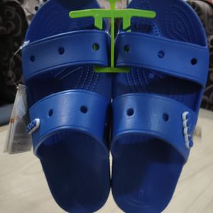 Crocs Classic Blue Sliders.