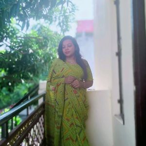 Green Bandhani Saree With Blouse And Peticoat