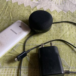 Phone , Charger And Speaker