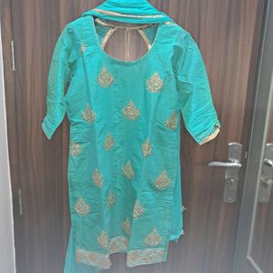 Turquoise teal color suit with Kundan