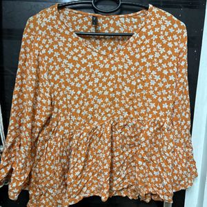 Pretty Orange Peplum Top