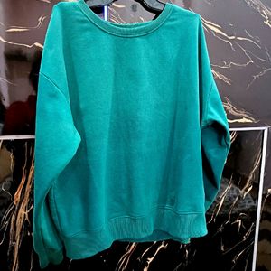 Roadster Woman Green Solid Sweatshirt