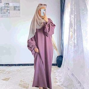 Button Abaya