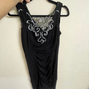 A Sexy Cheesy Mini Black Body Hugging Dress For Ho