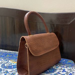 Brown Purse And Sling Bag