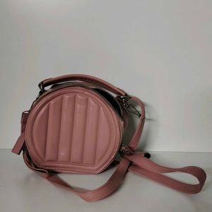 cute and pinteresty peach colour sling bag