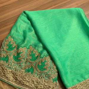 A Pretty Party Wear Saree With Blouse.