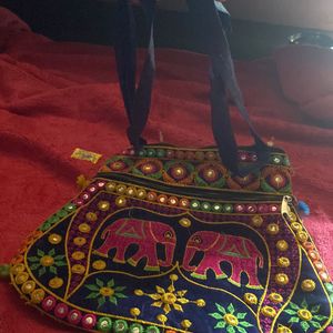 MULTI PURPOSE HANDBAG