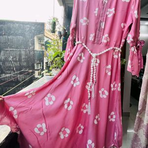 Pink floral dress with white flower pattern