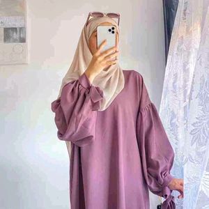 Button Abaya