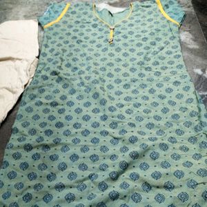 Light Green Kurti Cream Leggins.