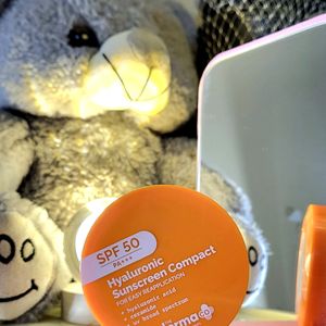 The Derma Co Sunscreen Compact.