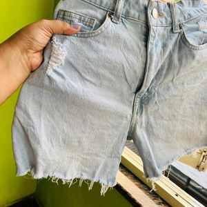 H&M light blue washed ripped shorts