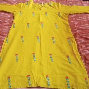 Yellow Colour Top With Nice Flower Design