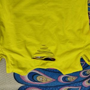 A Yellow Color Shoulder Cut Top.