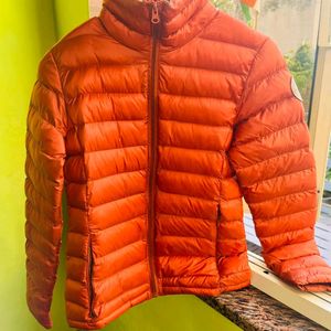 Orange puffer packable jacket