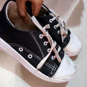 Black canvas sneakers