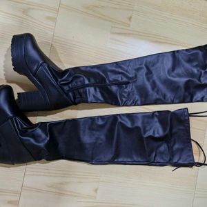 New leather boots knee length