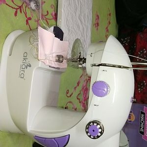 Brand new Akiara 4 in 1mini sewing machine with table