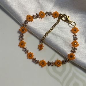 crystals and orange colour bracelet