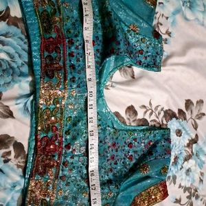 Embroidery In Net Blouse