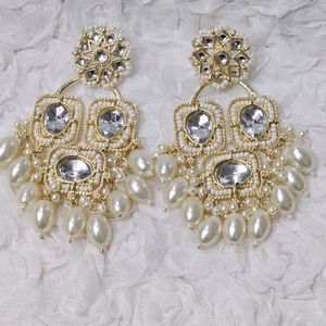 Trending Golden Earrings with Pearls.