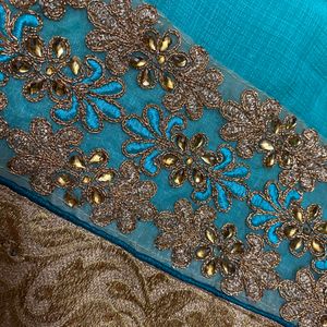 cyan saree with stitched blouse