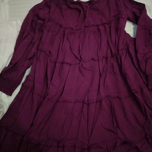 Grape Coloured Above Knee Length Top With Full Puffy Sleeves With Elastic Ath The End