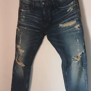 Ripped Faded Jeans Brand New