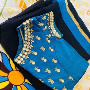 Blue Work Blouse And Black Saree