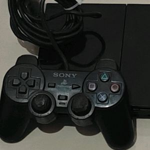 PS2 Console With 11 CD's (Non Working)