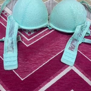 Light Green Color Puffy Bra Under Plastic Frame