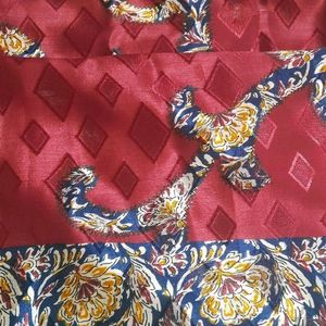 Reddish Maroon Kalamkari Design Silkish Saree